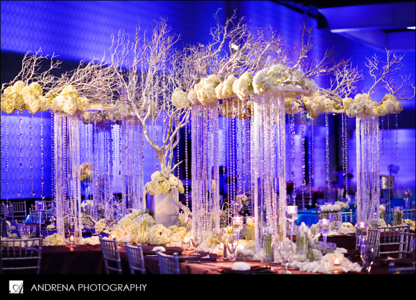 Wedding centerpiece branches roses and hanging crystal strands