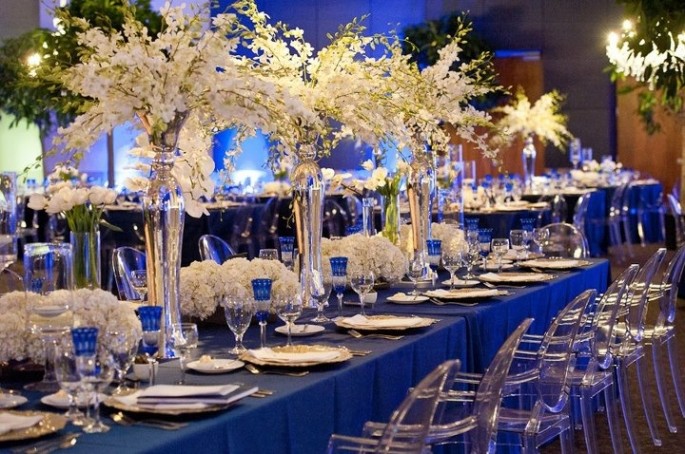 Tall and Low centerpieces on estate tables