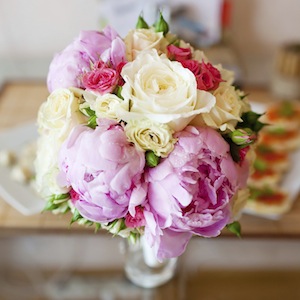 bridal bouquet of roses and peonies
